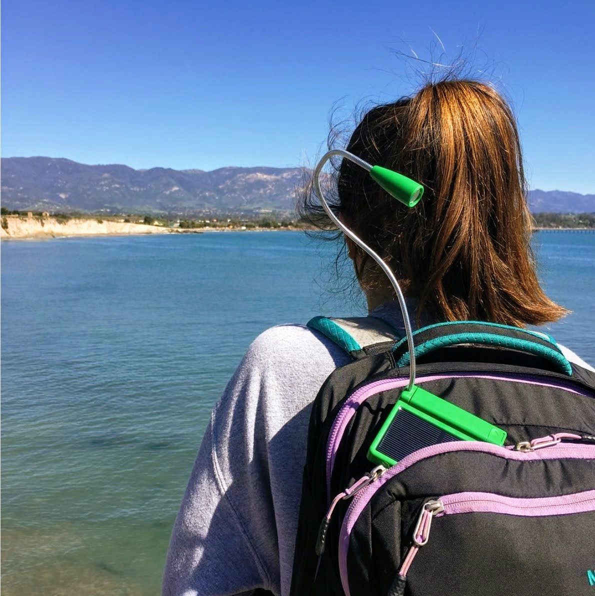 Luke Light charging on a backpack at the California coast
